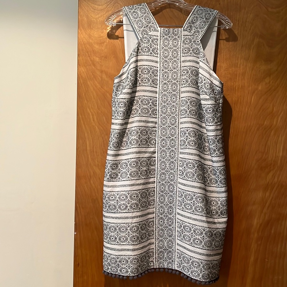 Maggy London black and white dress.  polyester , rayon and nylon, fully lined .
